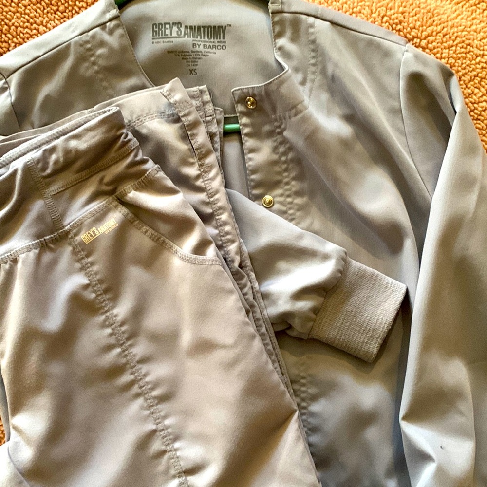Grey’s Anatomy jacket and pants light gray. Size extra small slightly worn